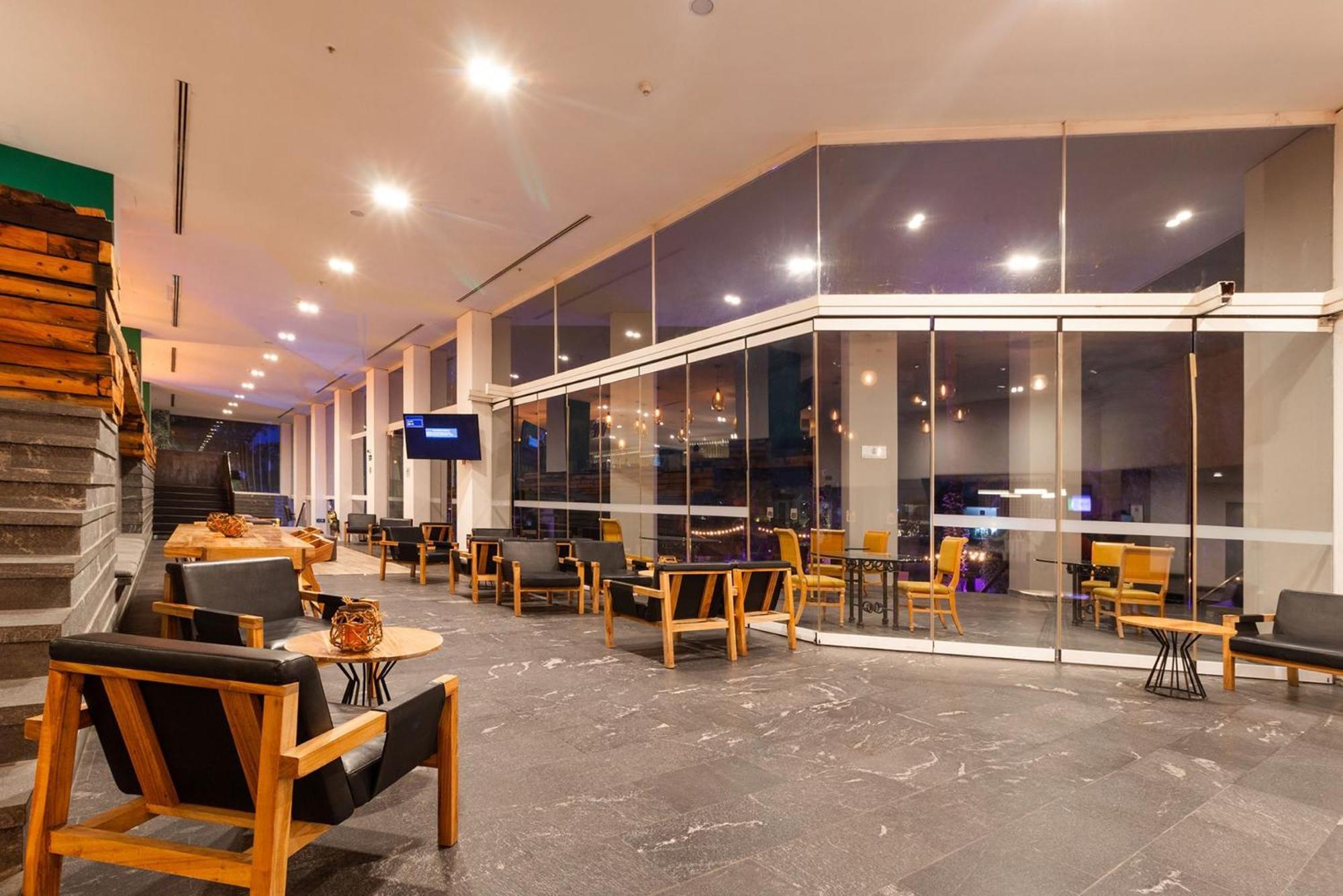 Hotel Camino Real Puebla Angelopolis Extérieur photo The lounge at the airport
